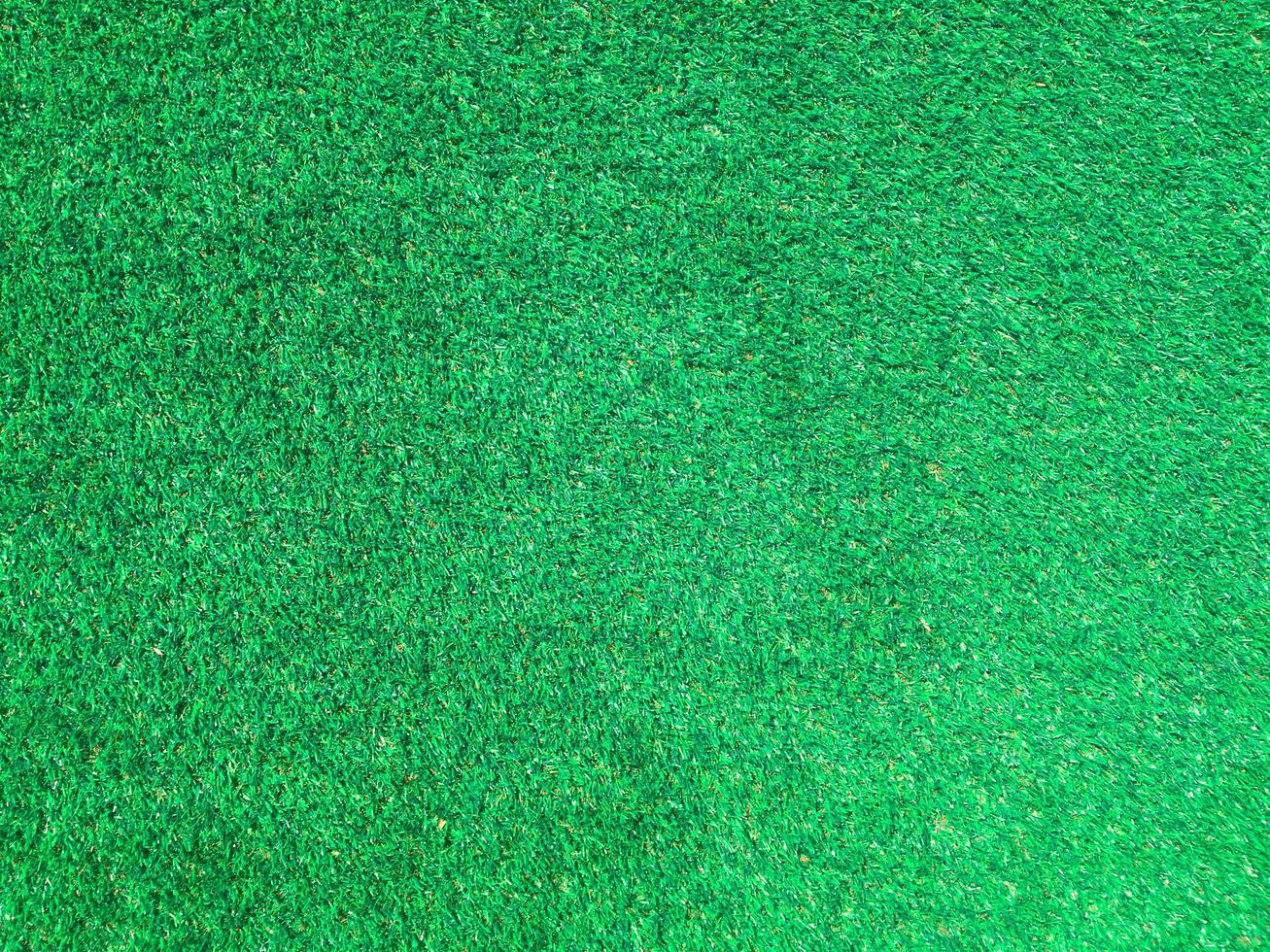 Artificial grass background for design, top view photo