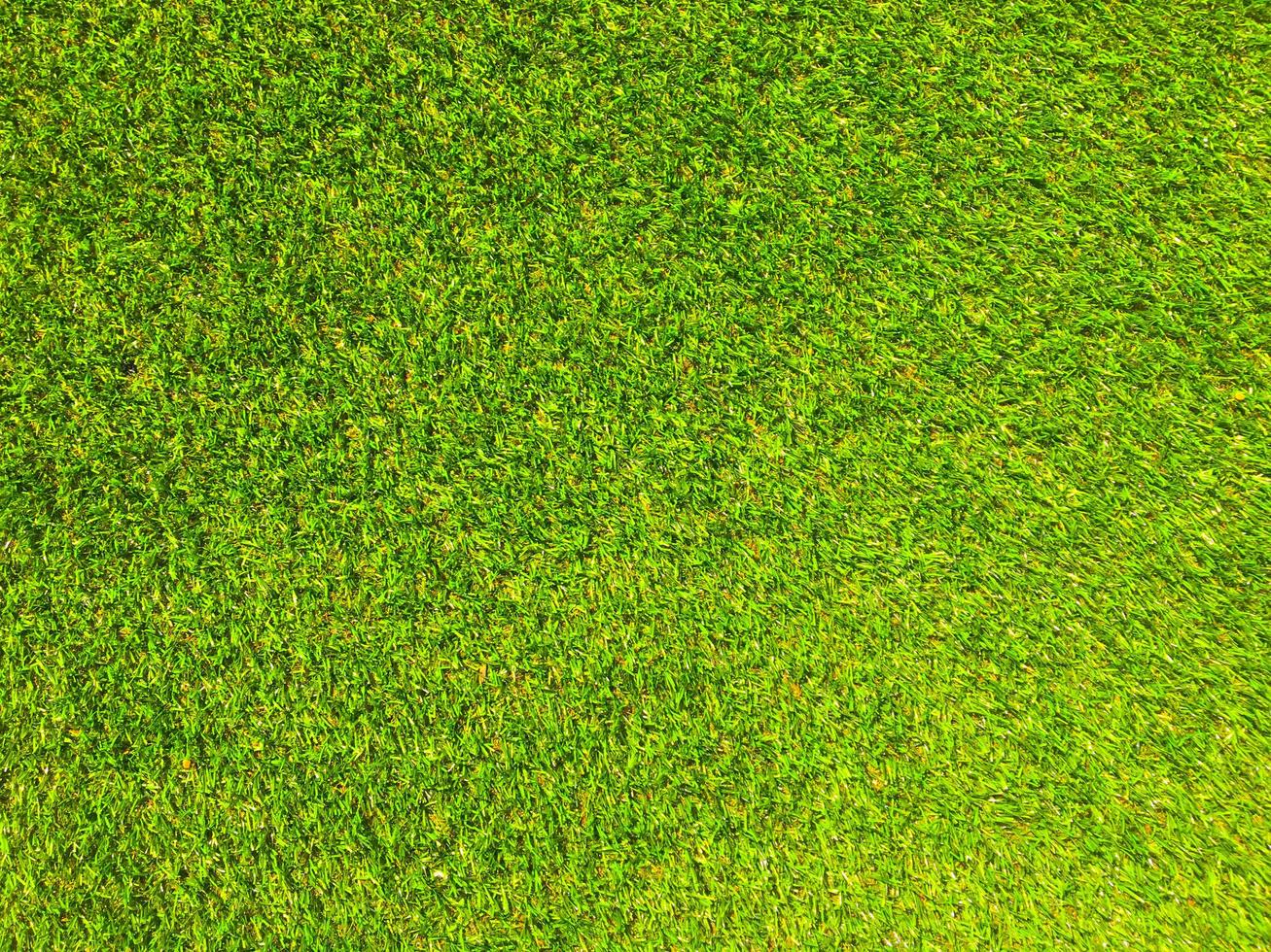 Artificial grass background for design, top view photo