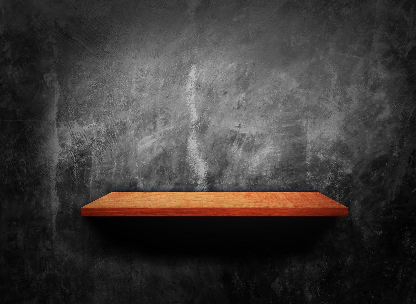 Wooden shelves on black brick wall texture background with clipping path for design photo