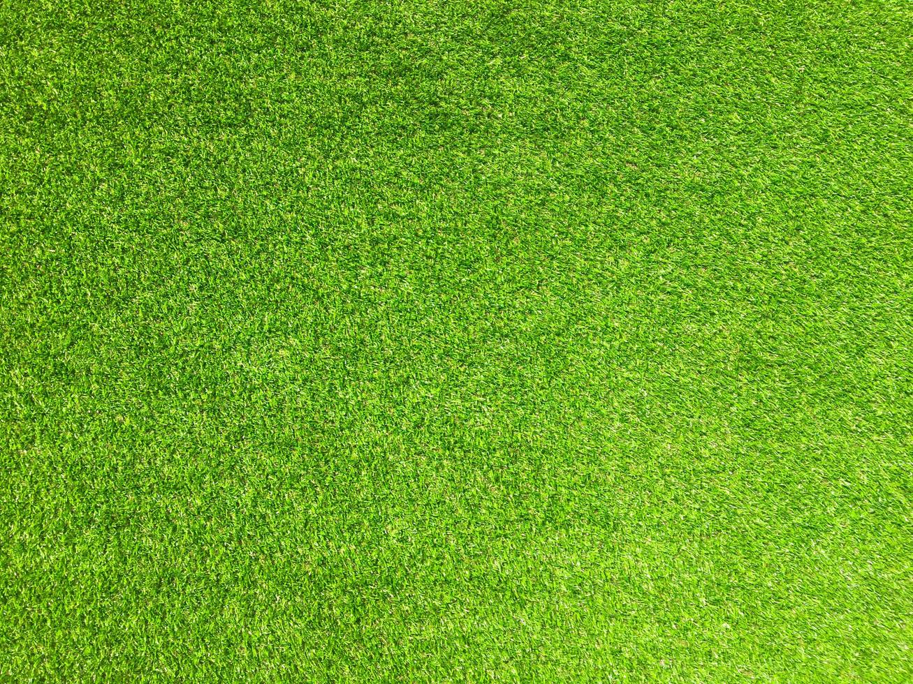 Artificial grass background for design, top view photo