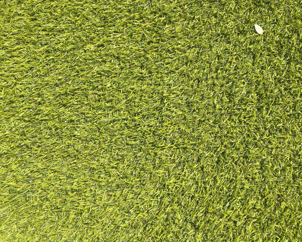 Artificial green grass texture background with copy space for work and design. photo