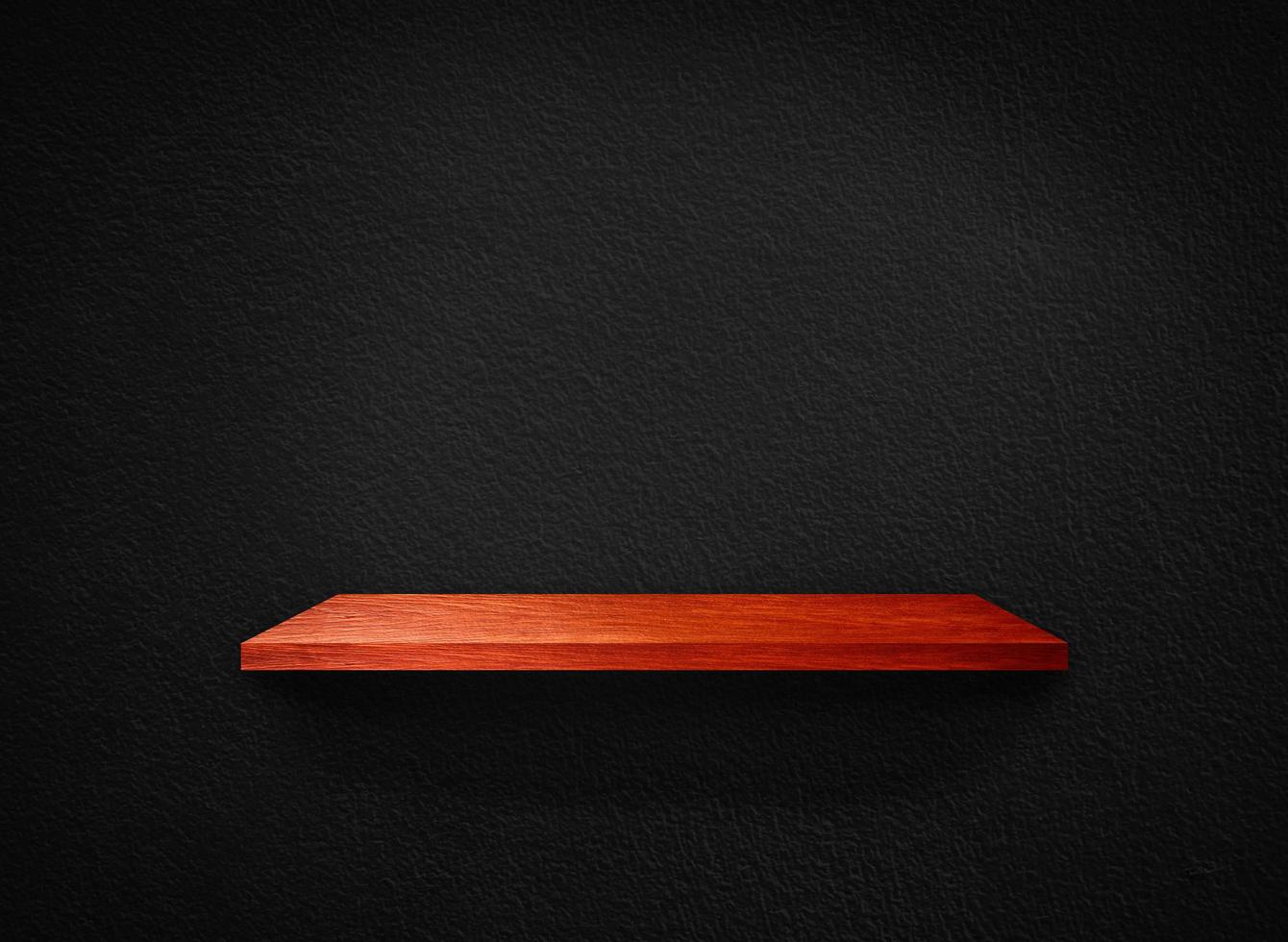 Light wood shelves on black wall texture in loft Style  background with clipping path. Design for wallpaper photo