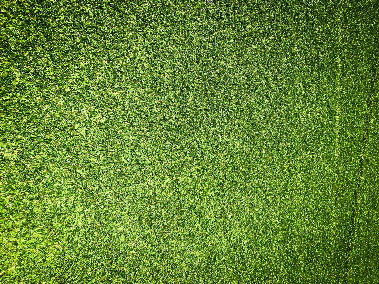 Beautiful green grass pattern from golf course for background. Copy space for work and design, Top view photo