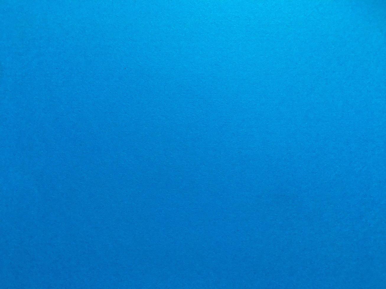 Minimal blue paper texture background with pattern for work and design photo
