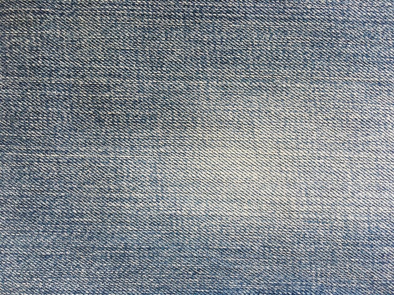 Blue jeans texture background with copy space for design photo
