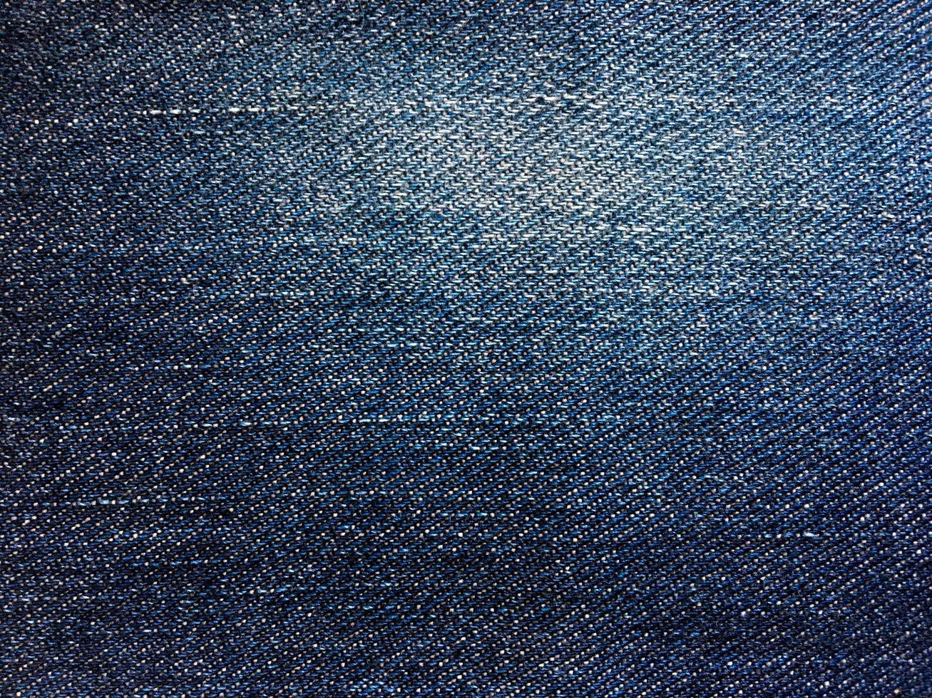 Classic blue jeans texture background with copy space for design or text photo