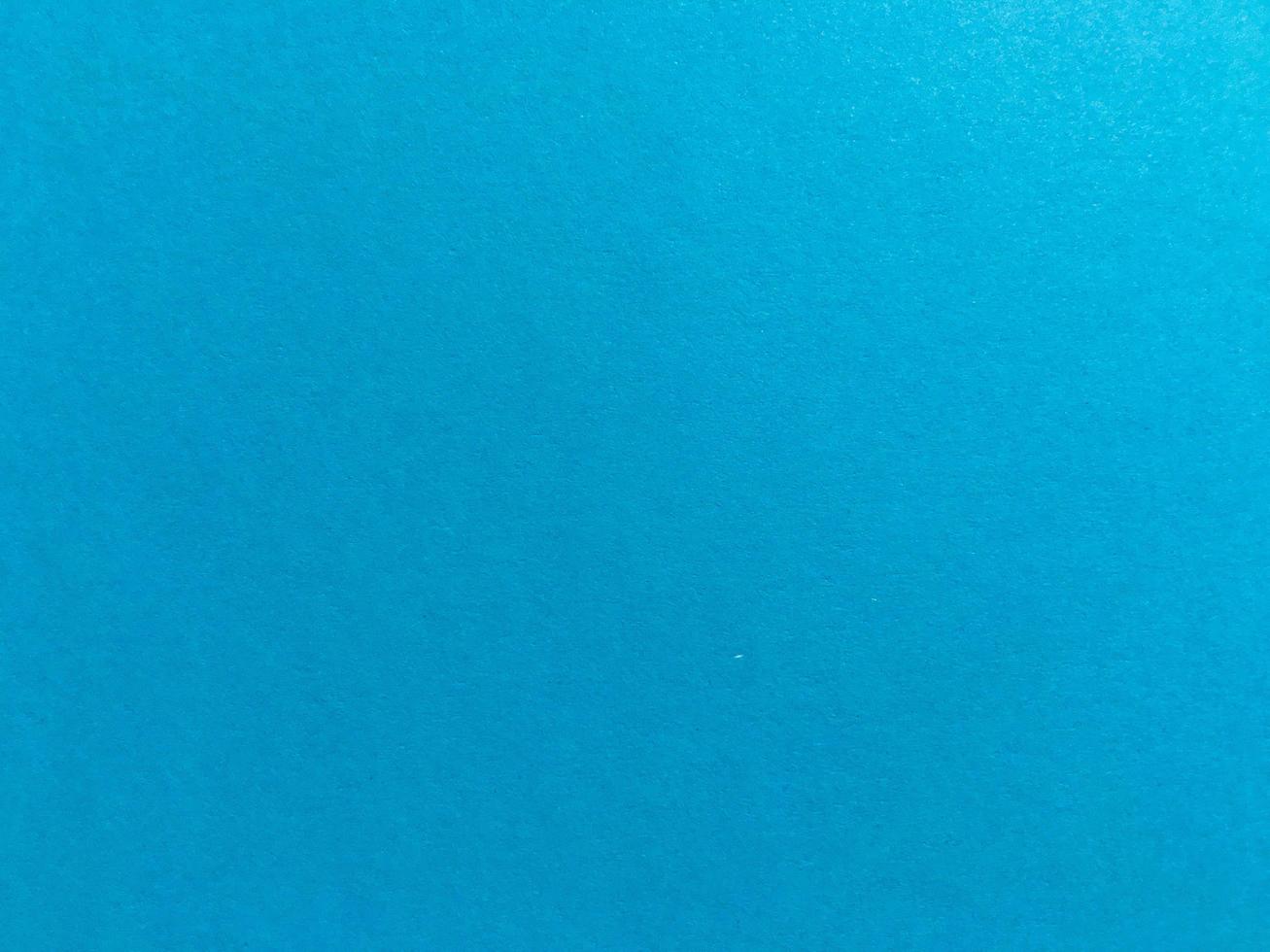 Minimal blue paper texture background with pattern for work and design photo