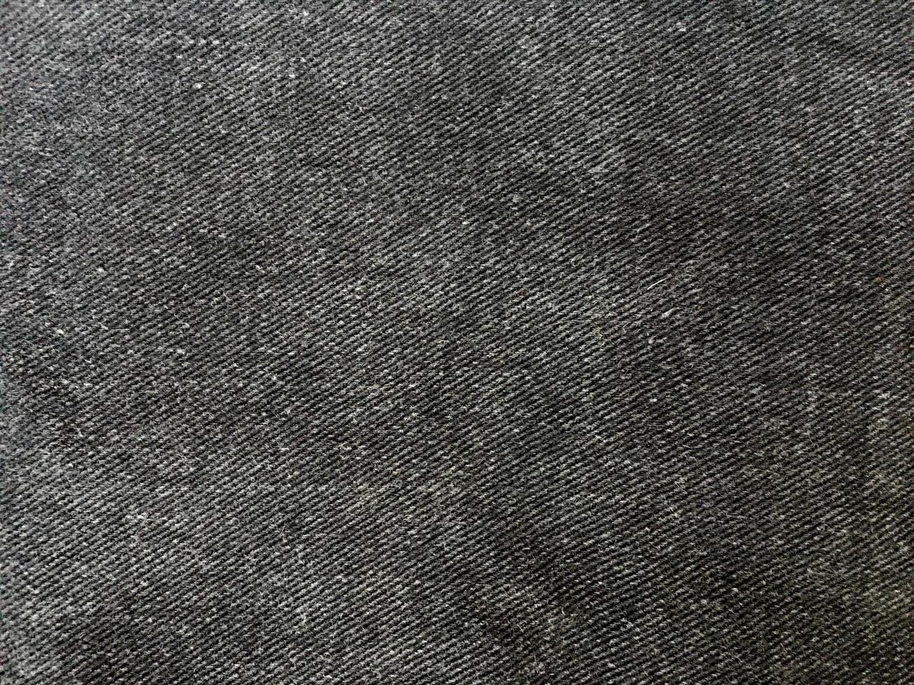 Black denim texture background with copy space for design photo