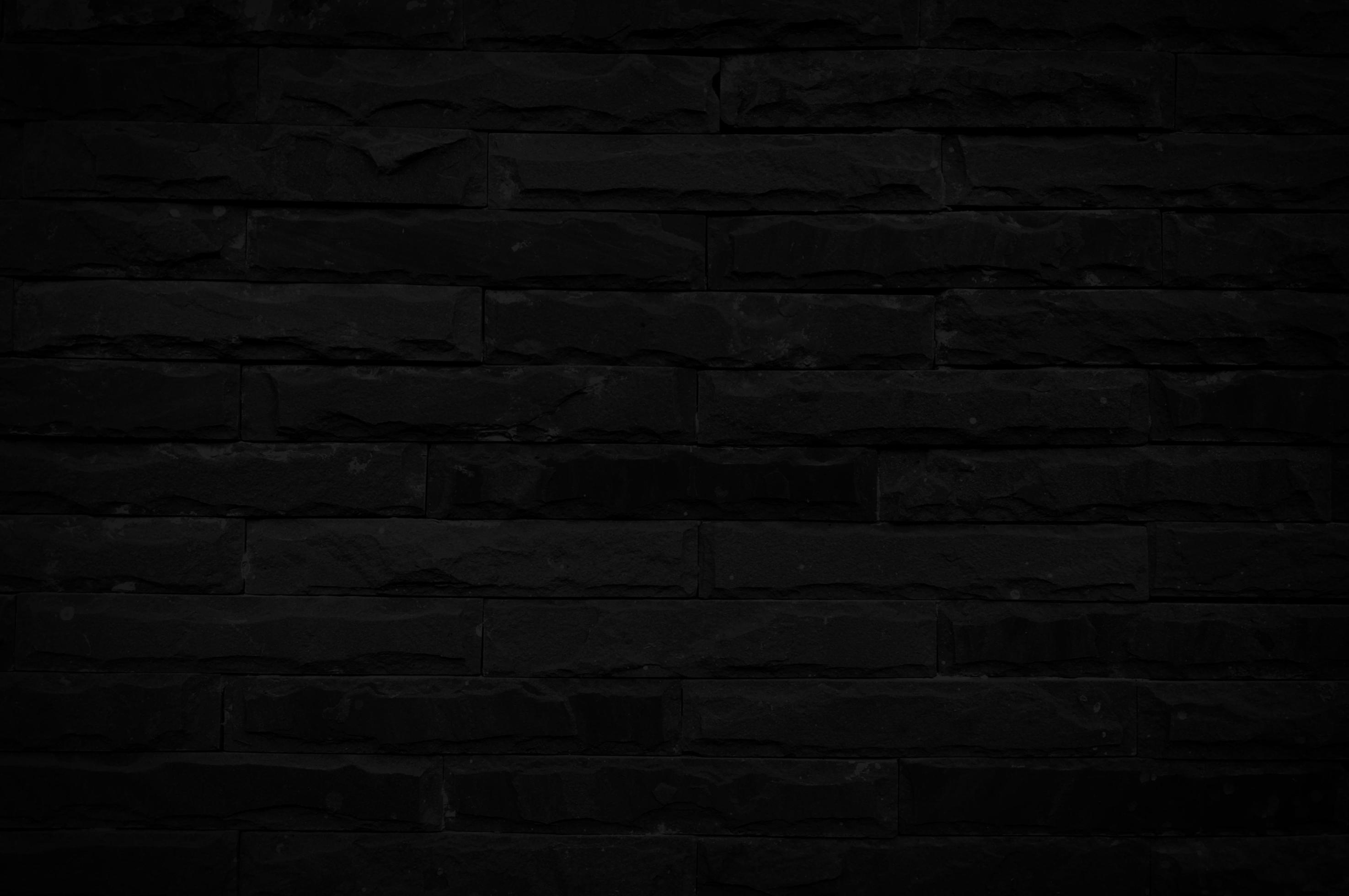 Old black brick wall texture for background with copy space for design.  dark wallpaper 12680818 Stock Photo at Vecteezy