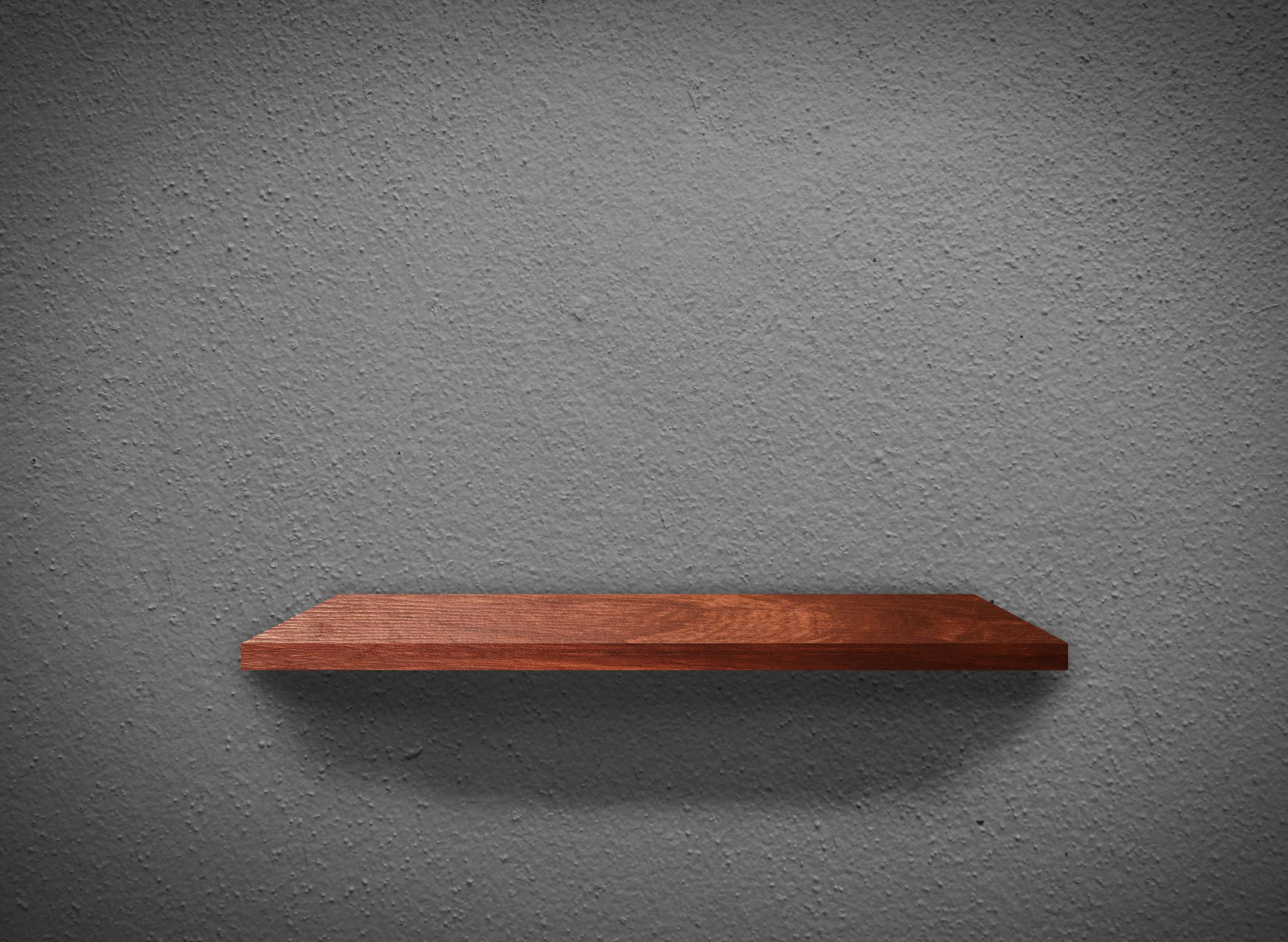 Hardwood shelves on concrete wall texture in minimal Style background