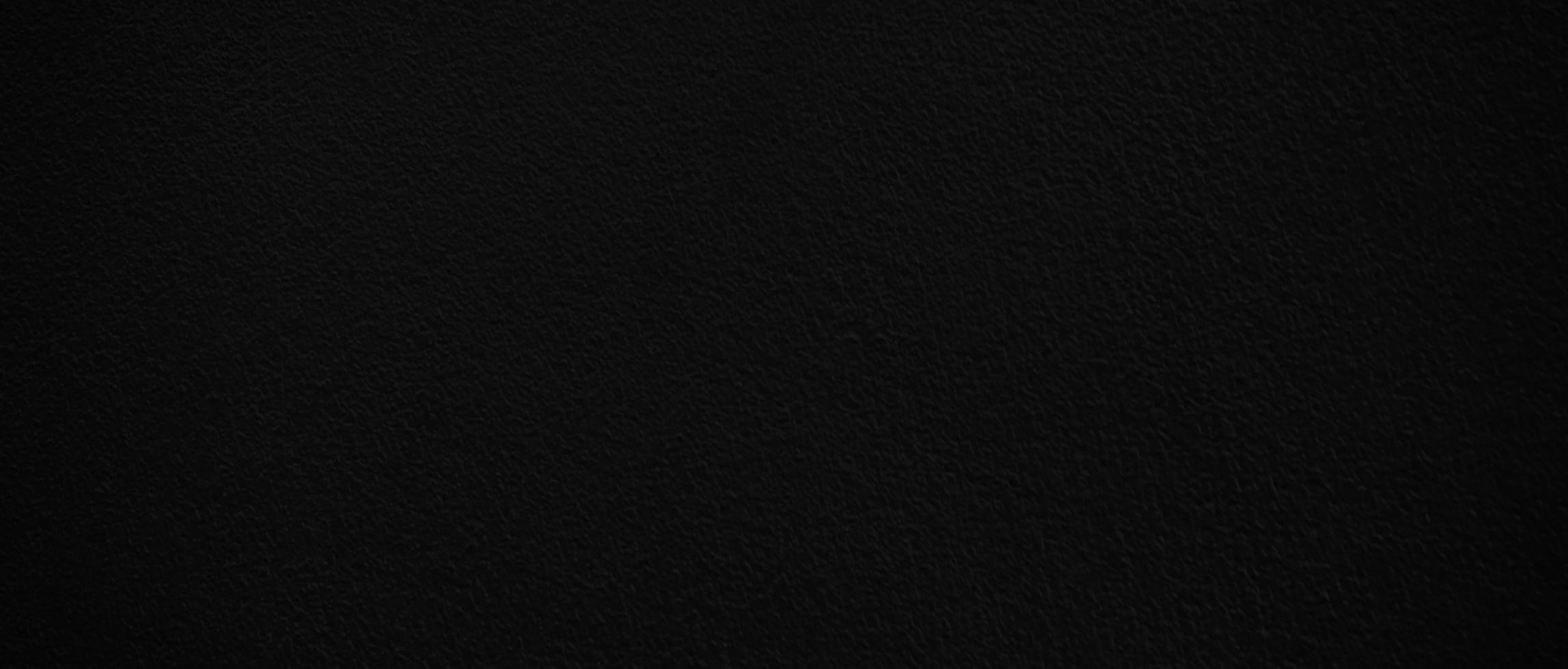 Blank black cement wall texture for background with copy space for design photo