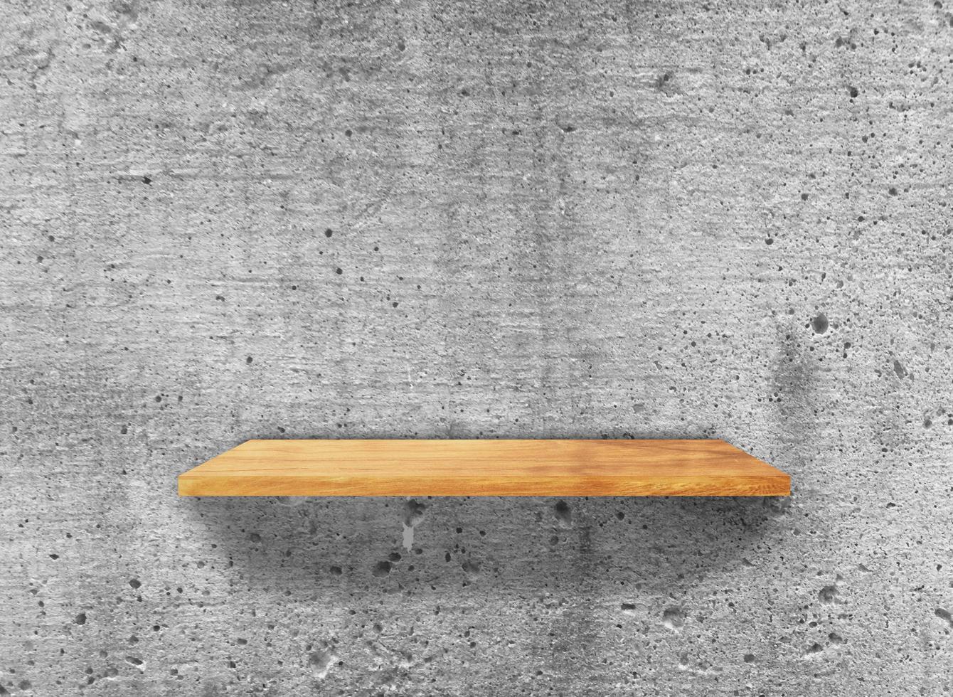 Rustic wooden shelf on grey concrete wall texture background with clipping path. pattern wallpaper photo