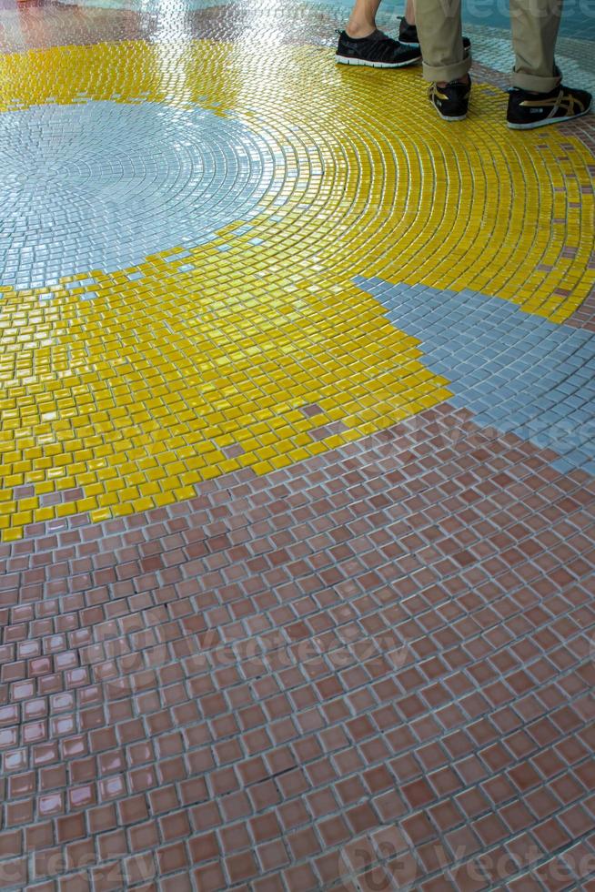 Colorful tiles on the floor of hall photo