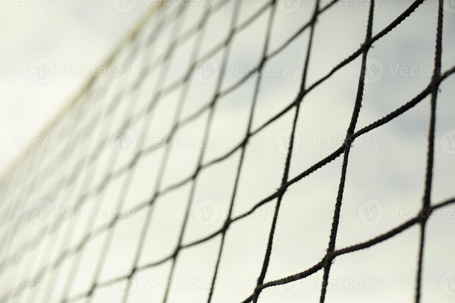 Sports net. Volleyball equipment. Grid against sky. photo