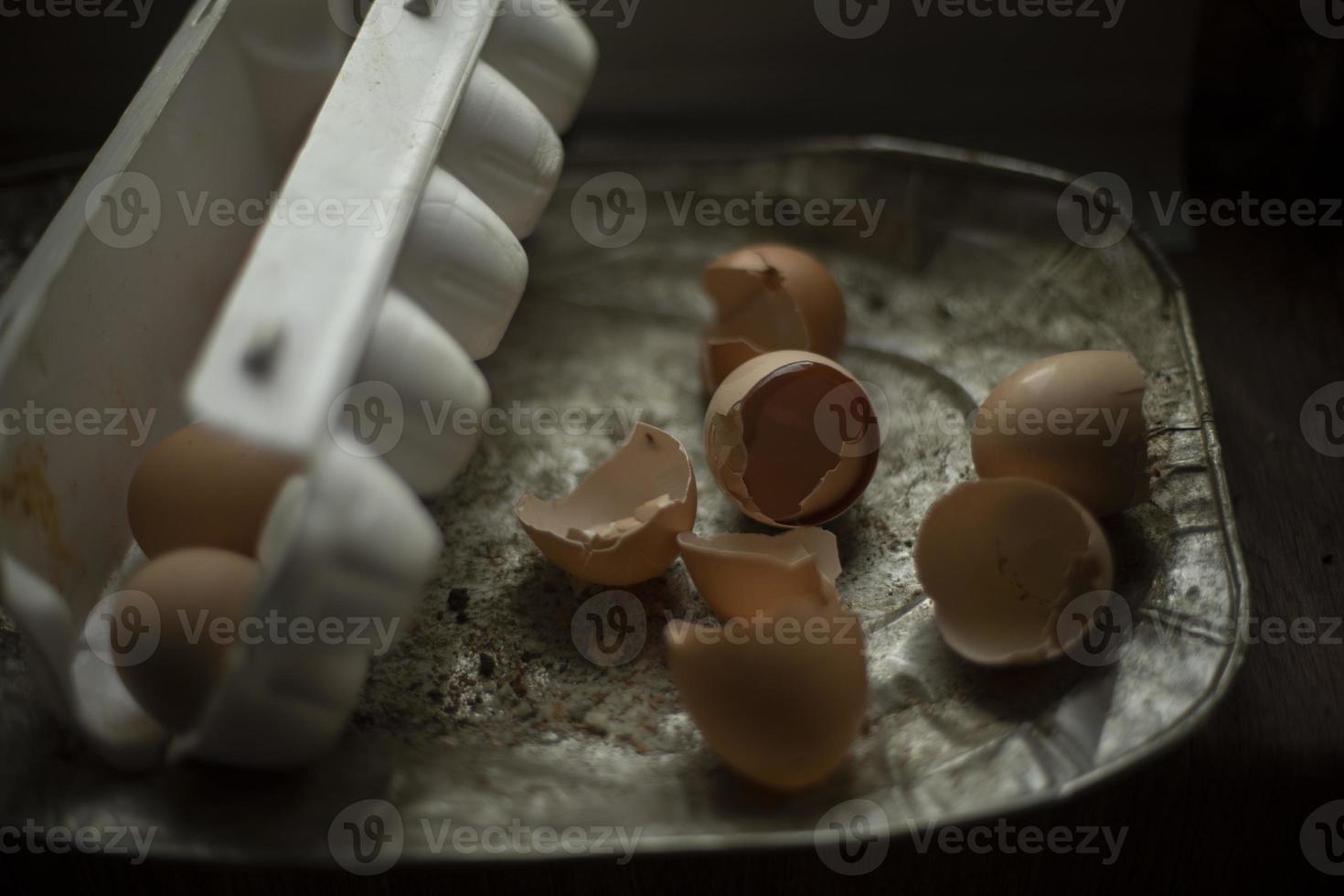 Broken eggs. Eggshell. Chicken eggs are on table. Food Details. photo