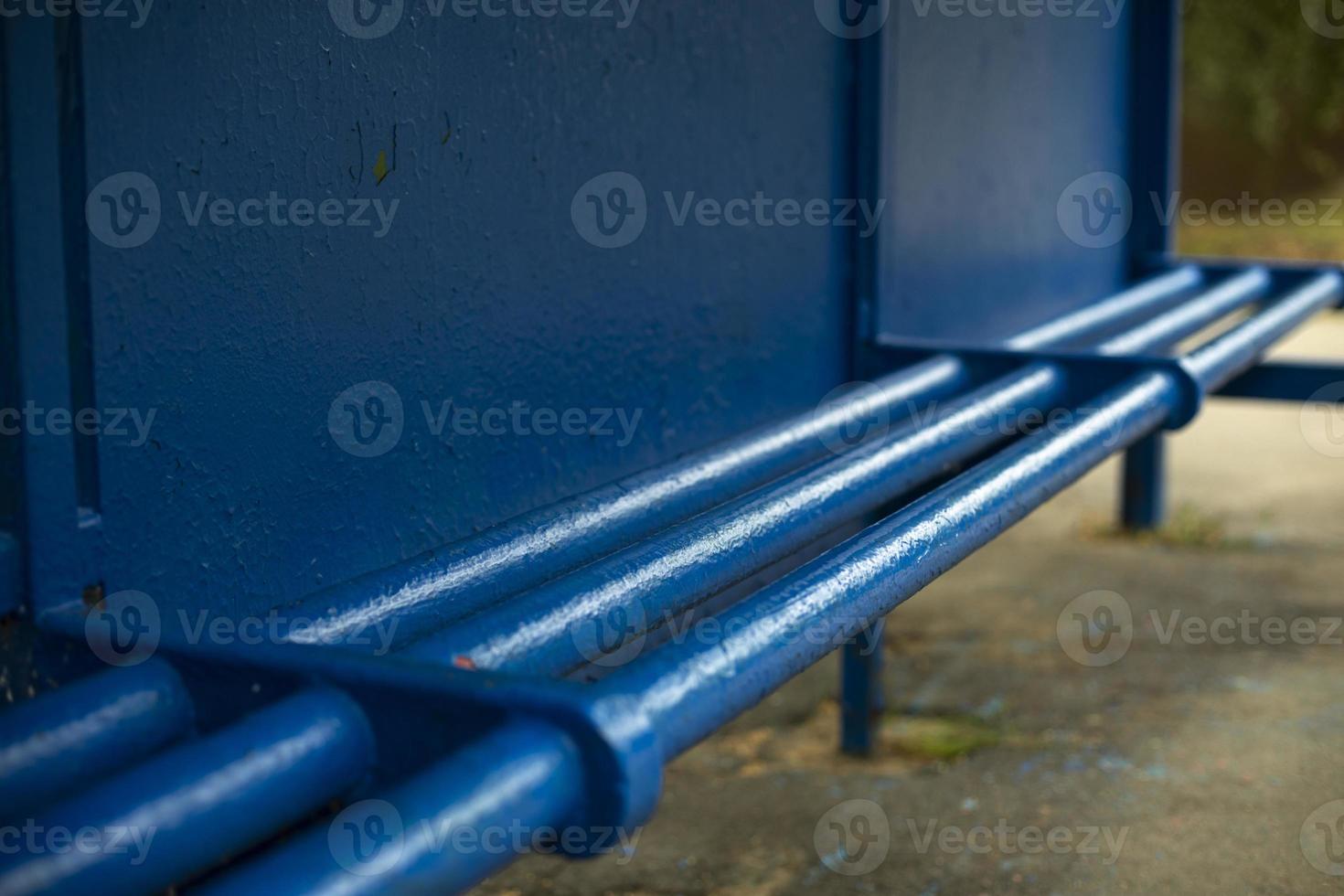 Bus stop in village. Blue bus stop in summer. Transport construction. photo