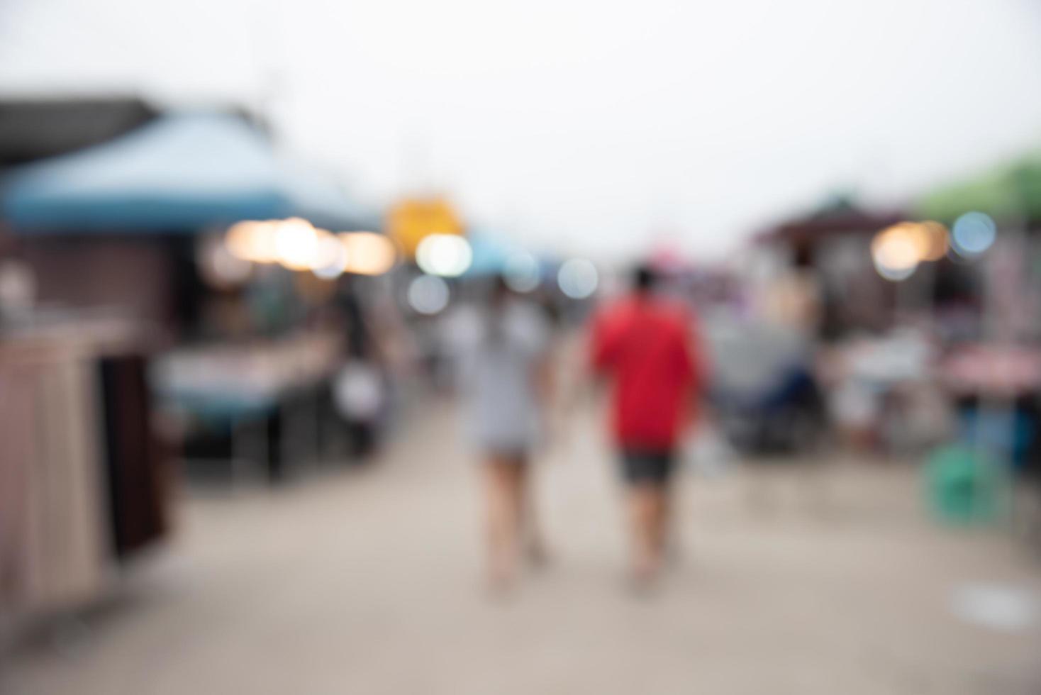 blur festival pedestrian market shopping street for abstract background. photo