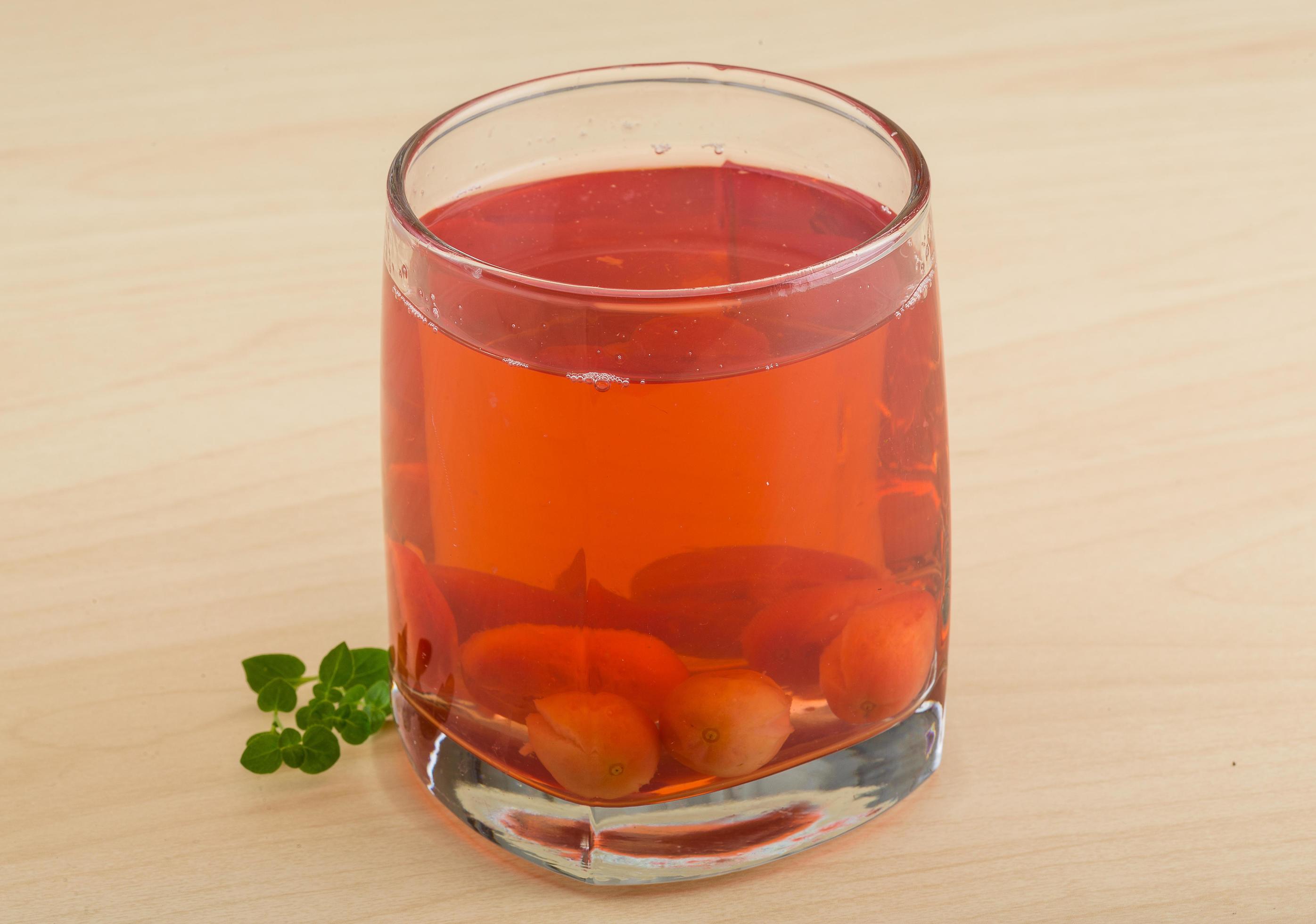 Cornel compote on wooden background 12686179 Stock Photo at Vecteezy