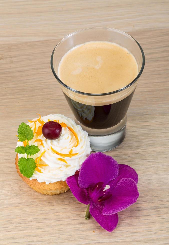 Cupcake on wooden background photo