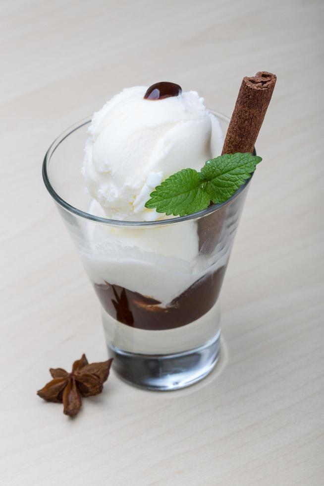 Ice cream on wooden background photo