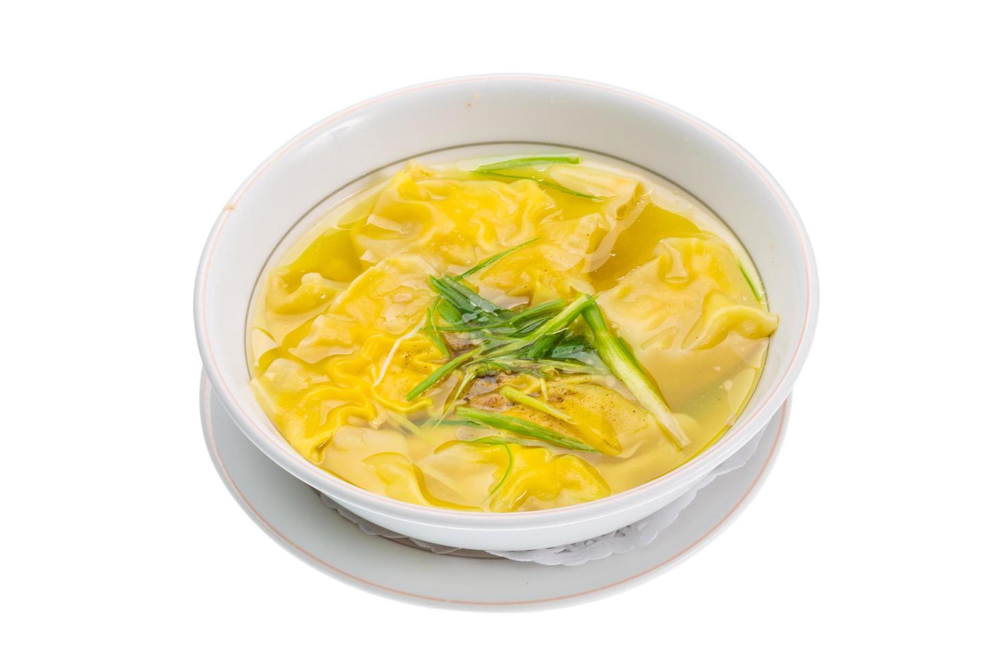 Chinese soup in a bowl on white background photo