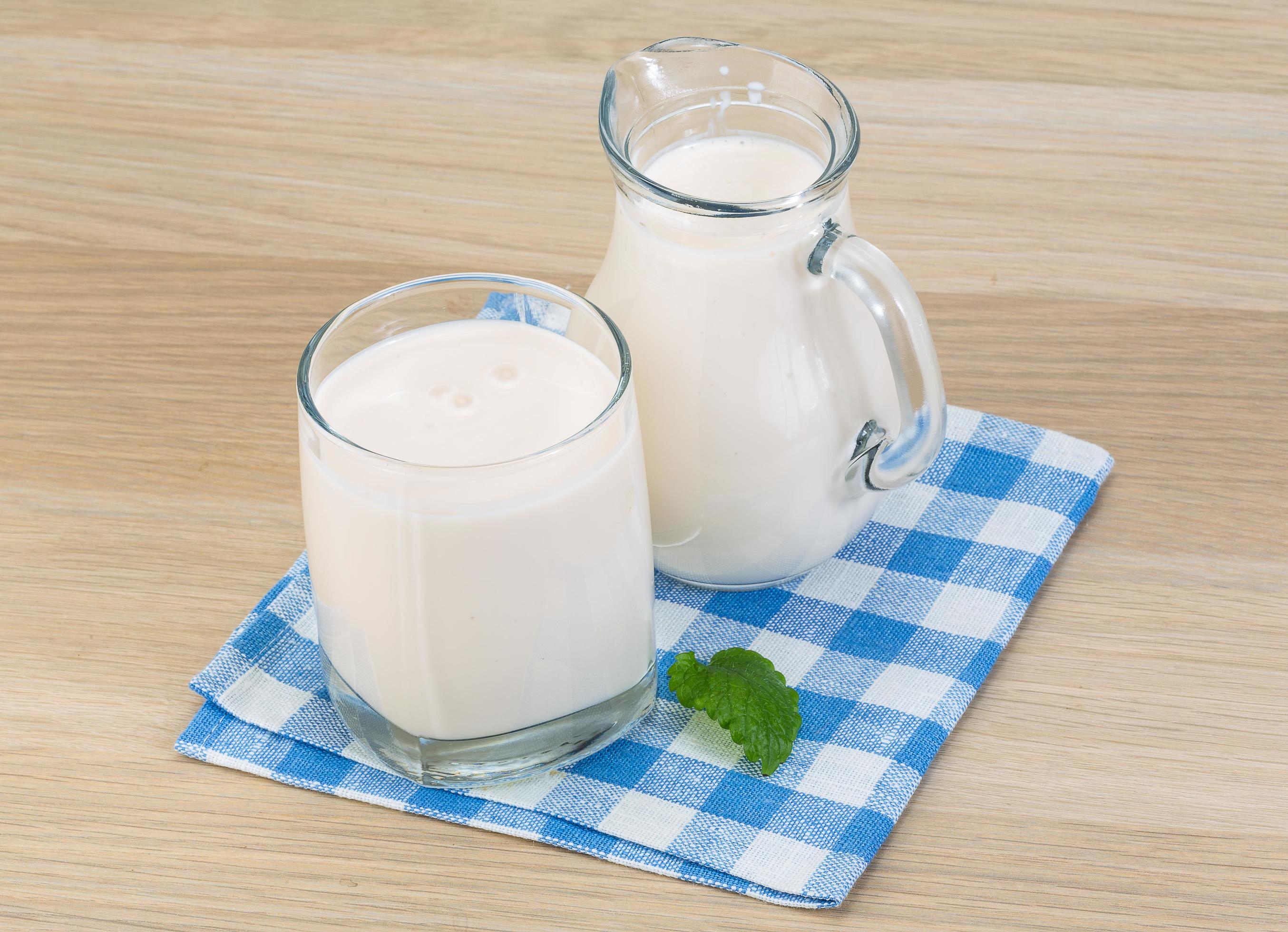 Kefir on wooden background 12688457 Stock Photo at Vecteezy