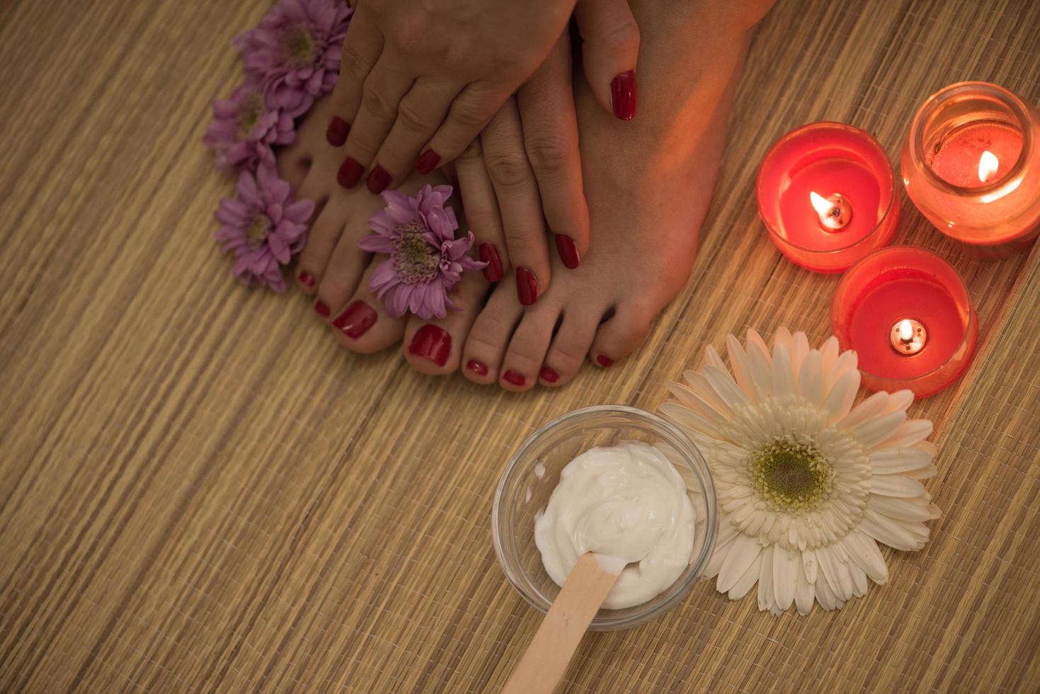 female feet and hands at spa salon photo