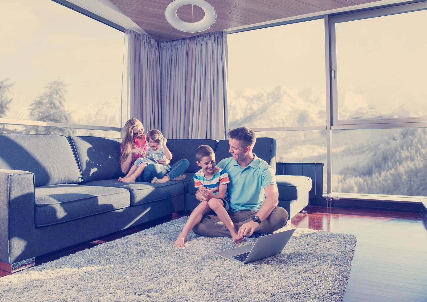 Happy family playing a video game photo