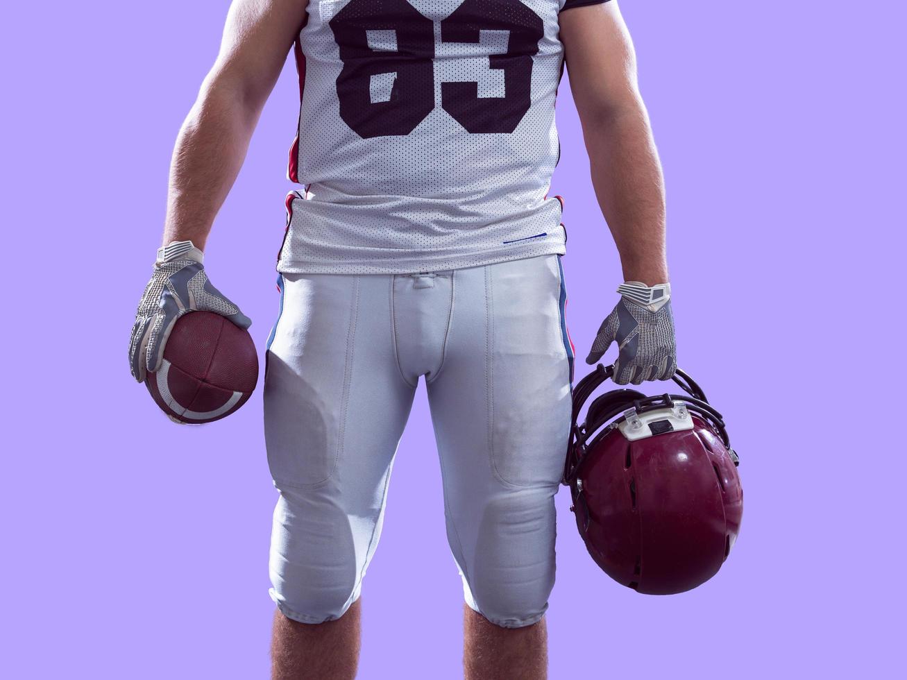 closeup American Football Player isolated on colorfull background photo