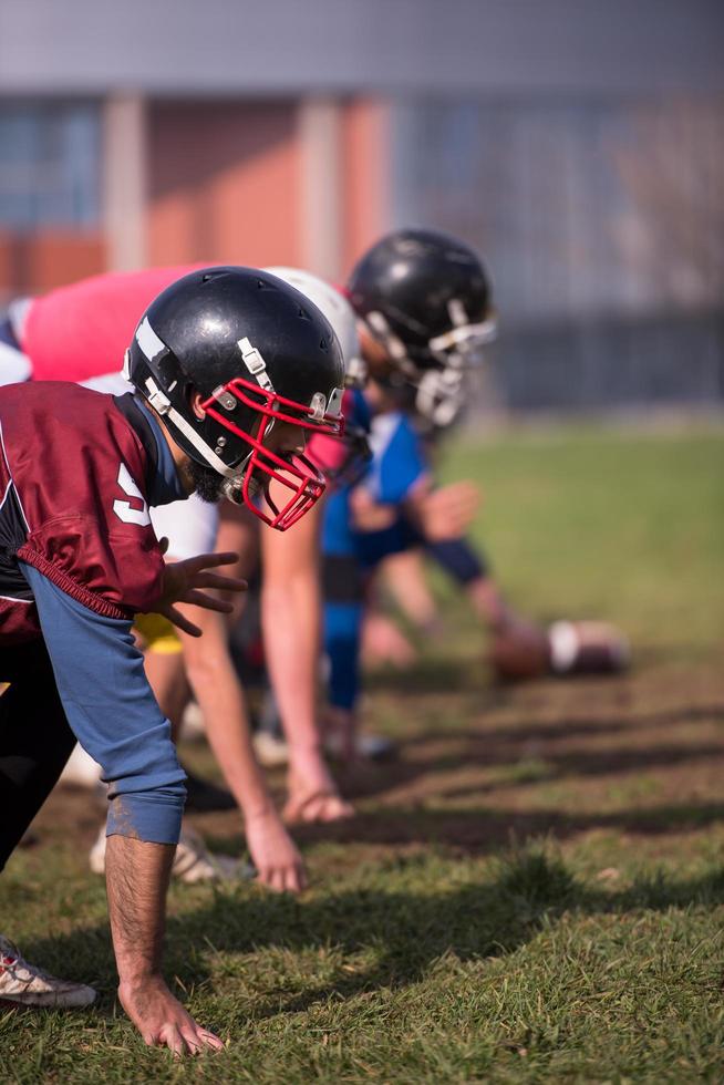 american football team in action photo