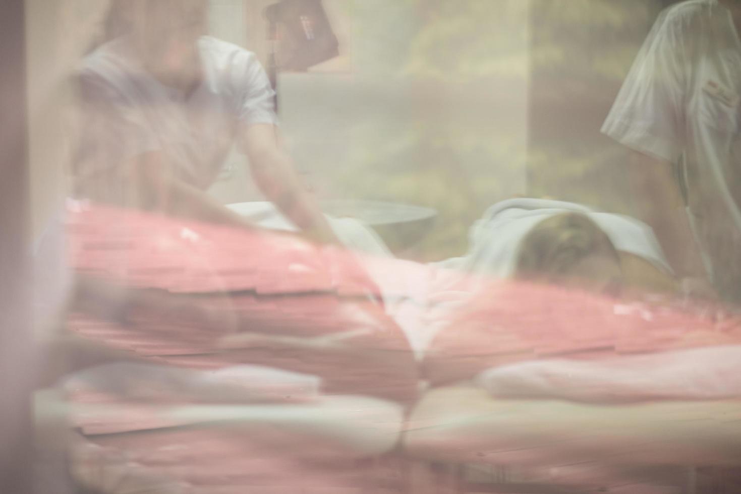 couple receiving a back massage photo