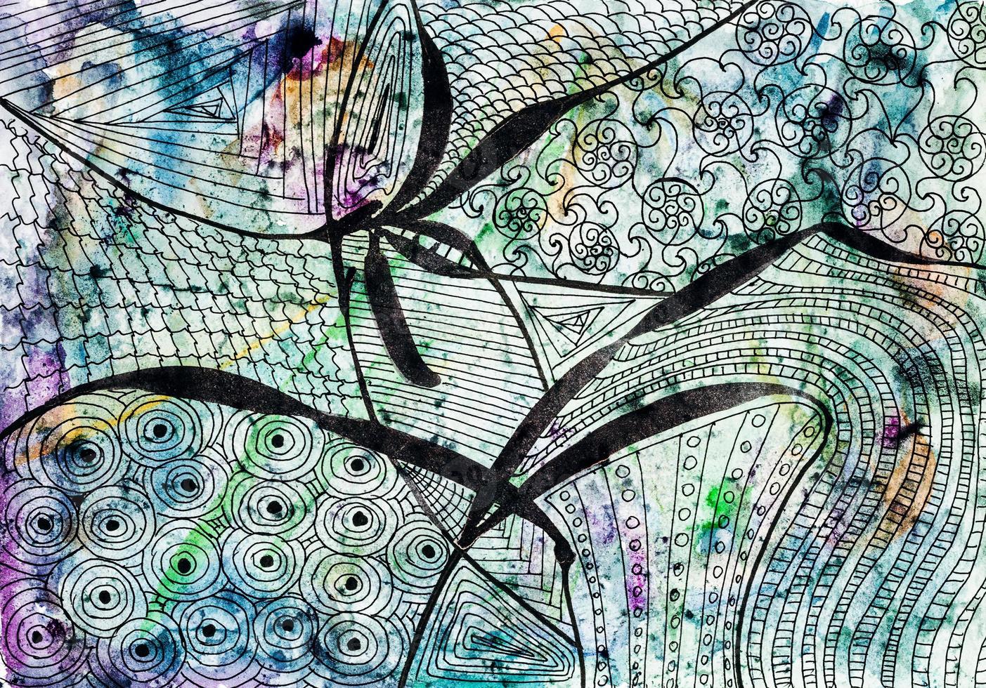 abstract black floral pattern on colored paper photo