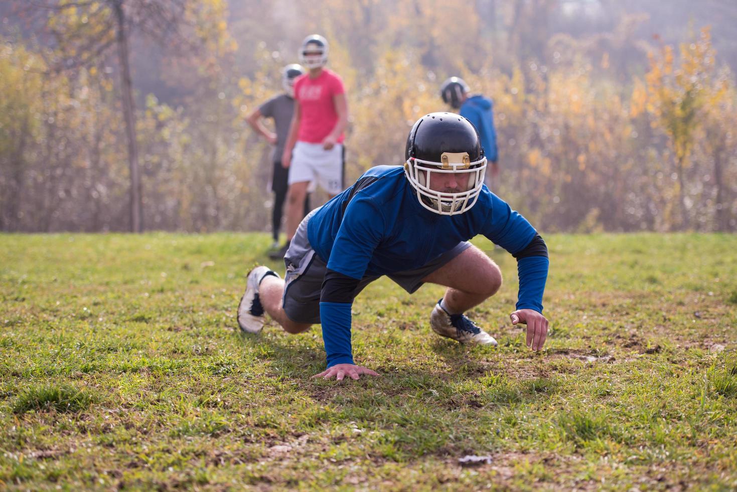 american football player in action photo