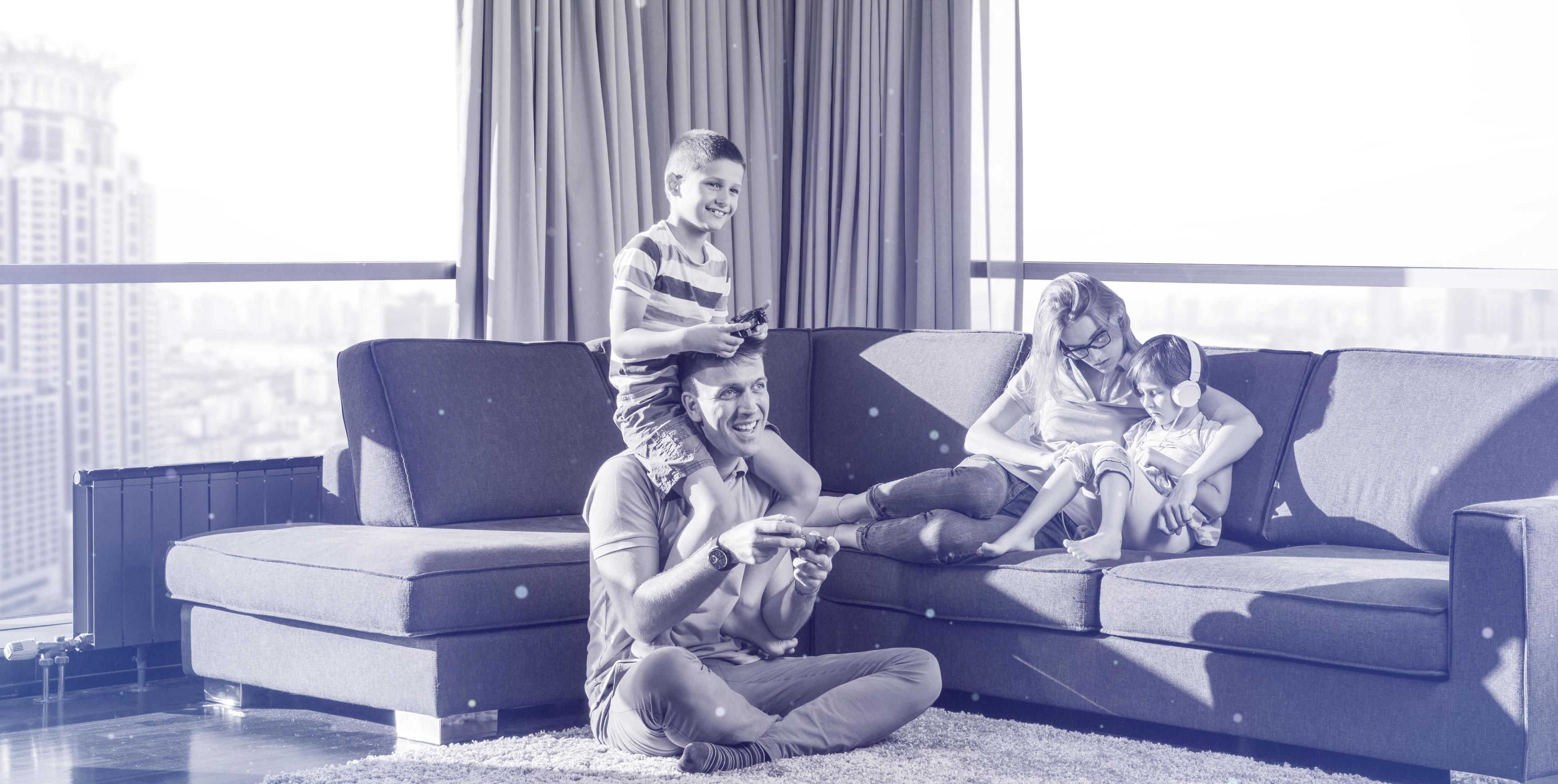 Happy family playing a video game 12692771 Stock Photo at Vecteezy
