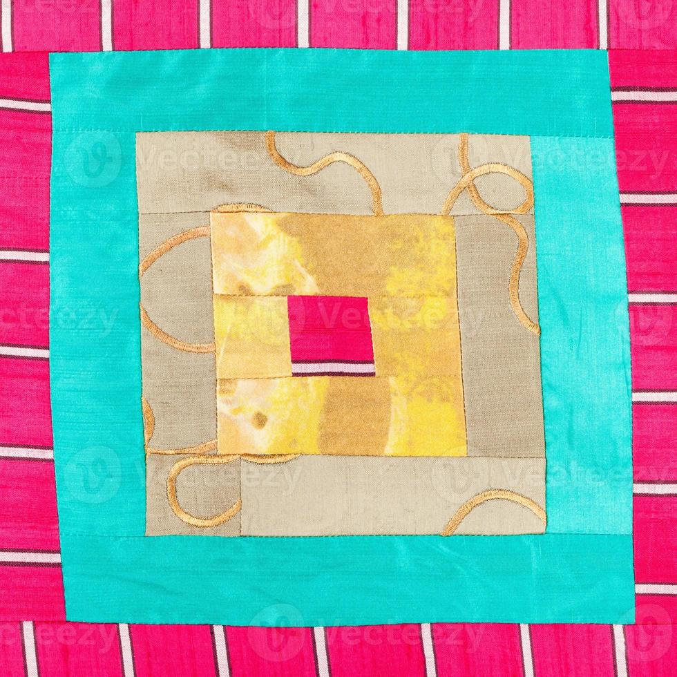 square pattern of patchwork cloth photo