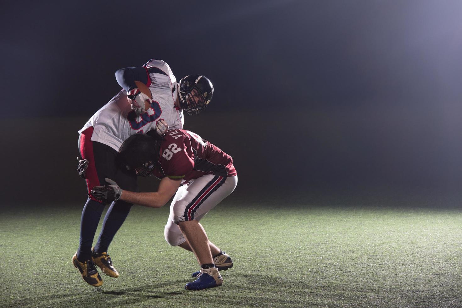 American football players in action photo