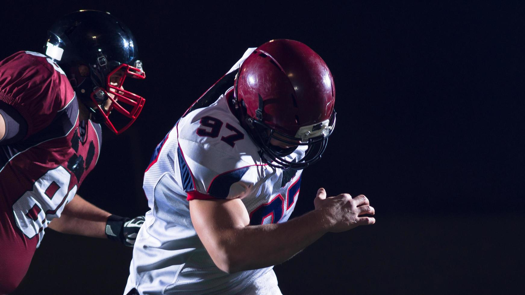 American football players in action photo