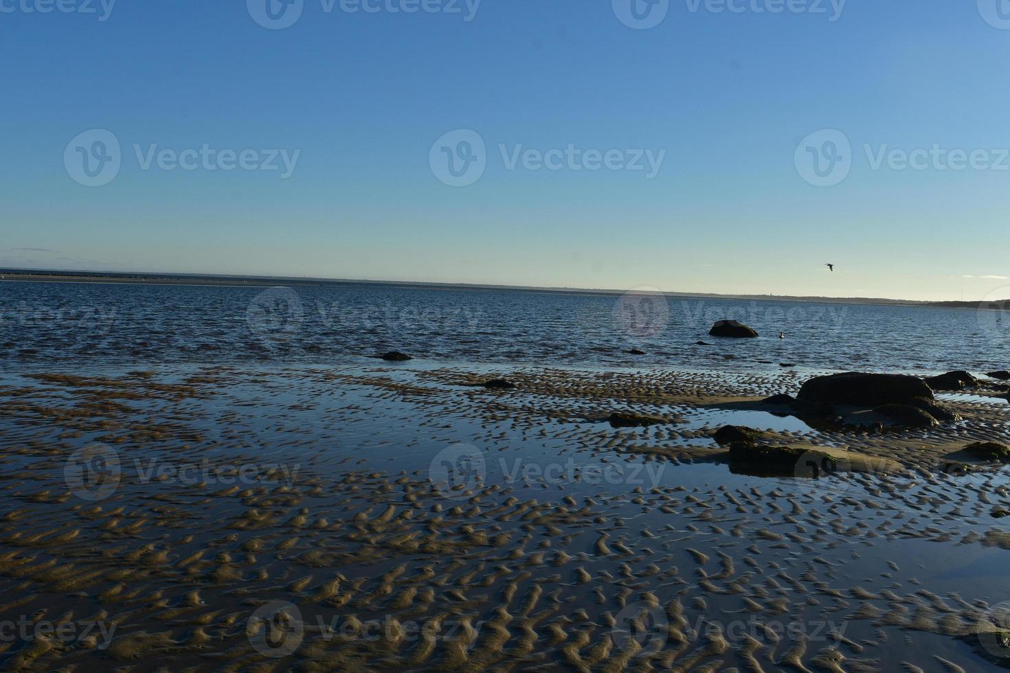 Captivating sand ripples on the shore of cape cod photo