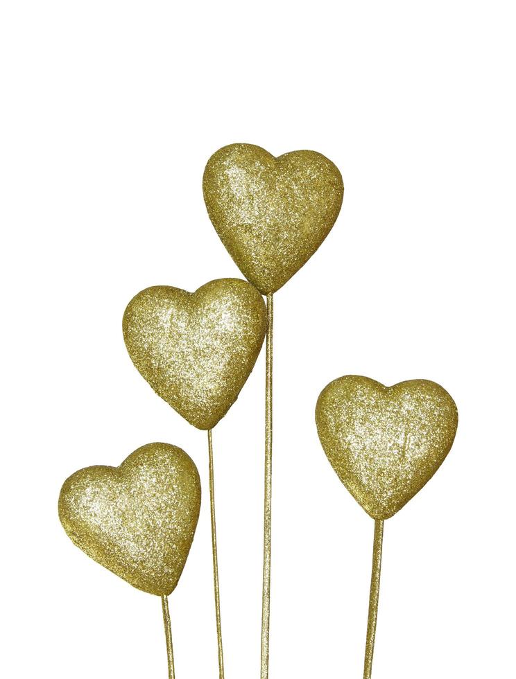 Golden decoration heart isolated on white background photo