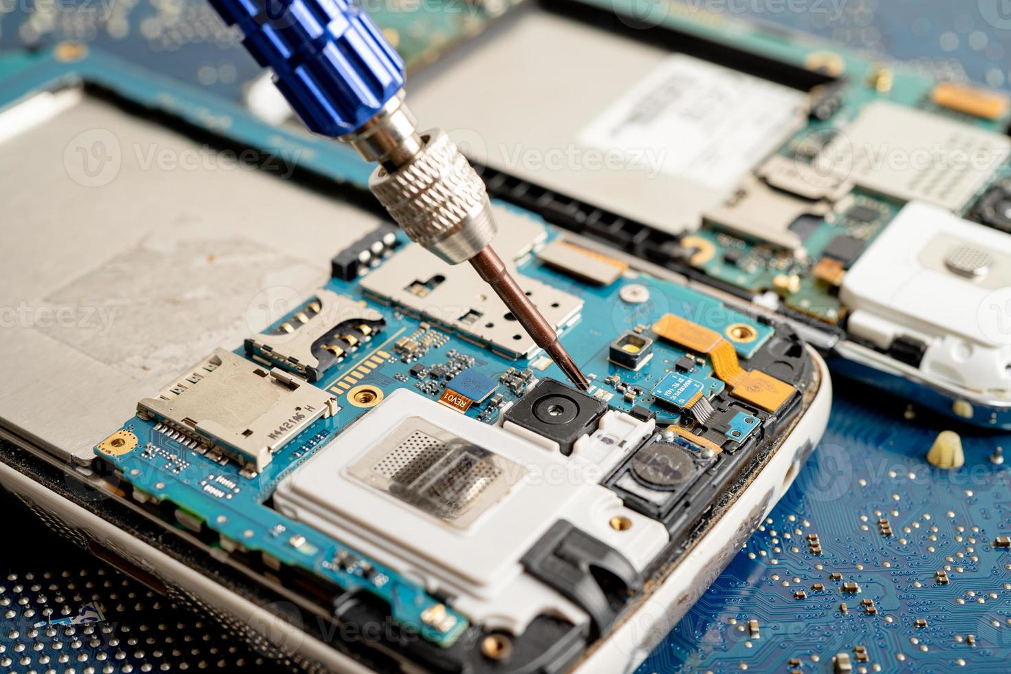 Repairing and upgrade mobile phone, electronic, computer hardware and technology concept. photo