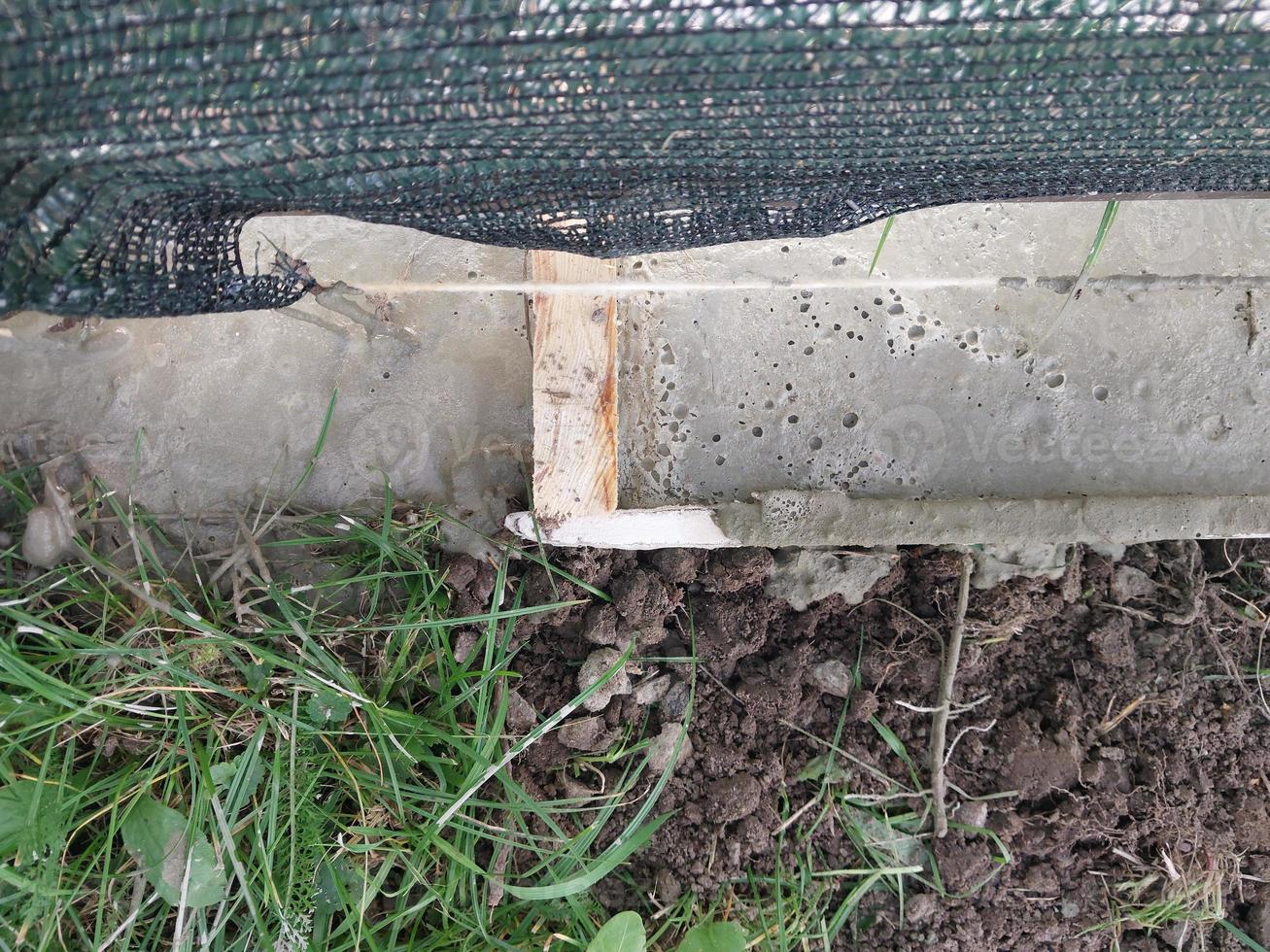 Construction of a strip foundation for a fence photo