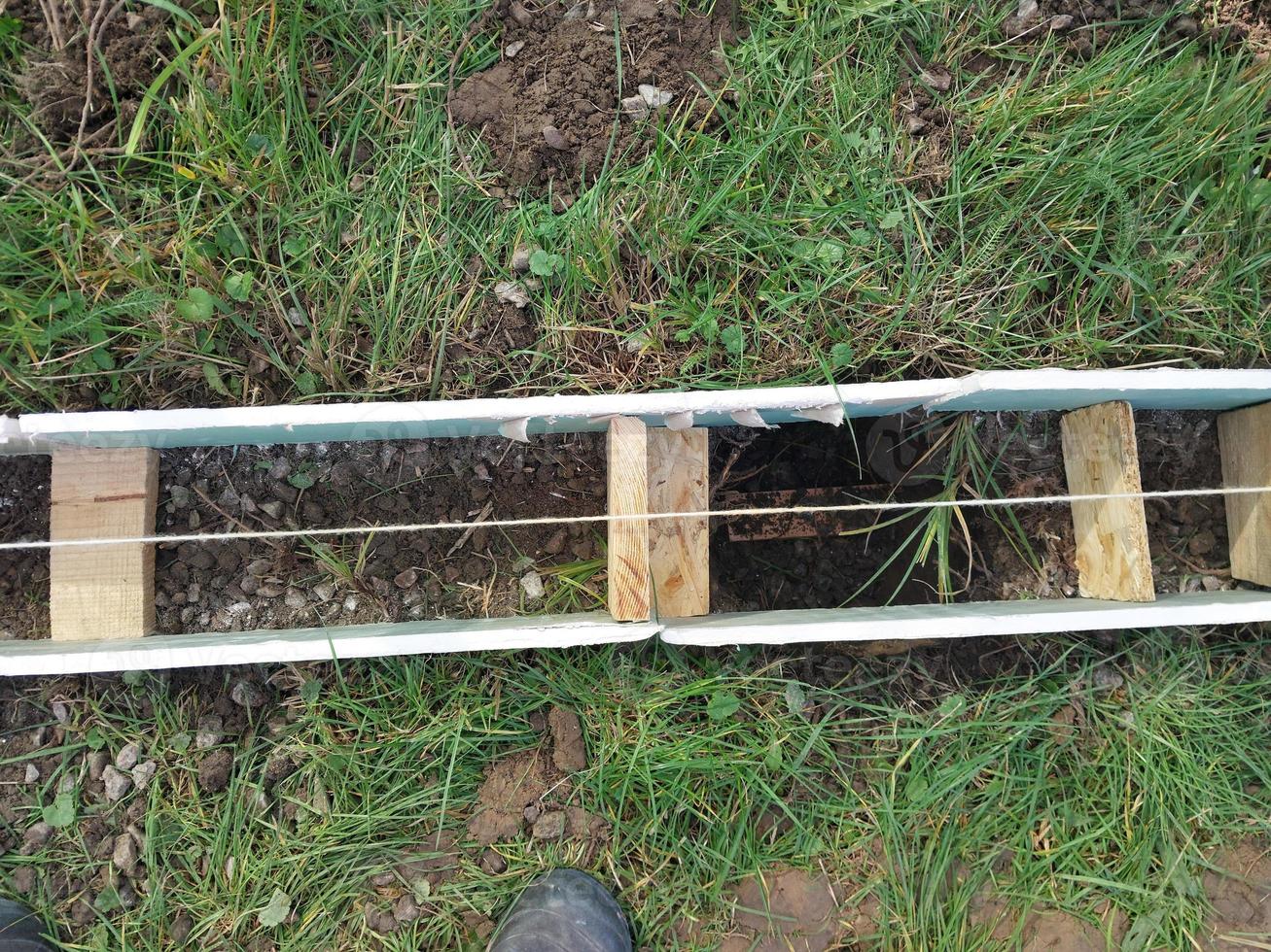 Construction of a strip foundation for a fence photo