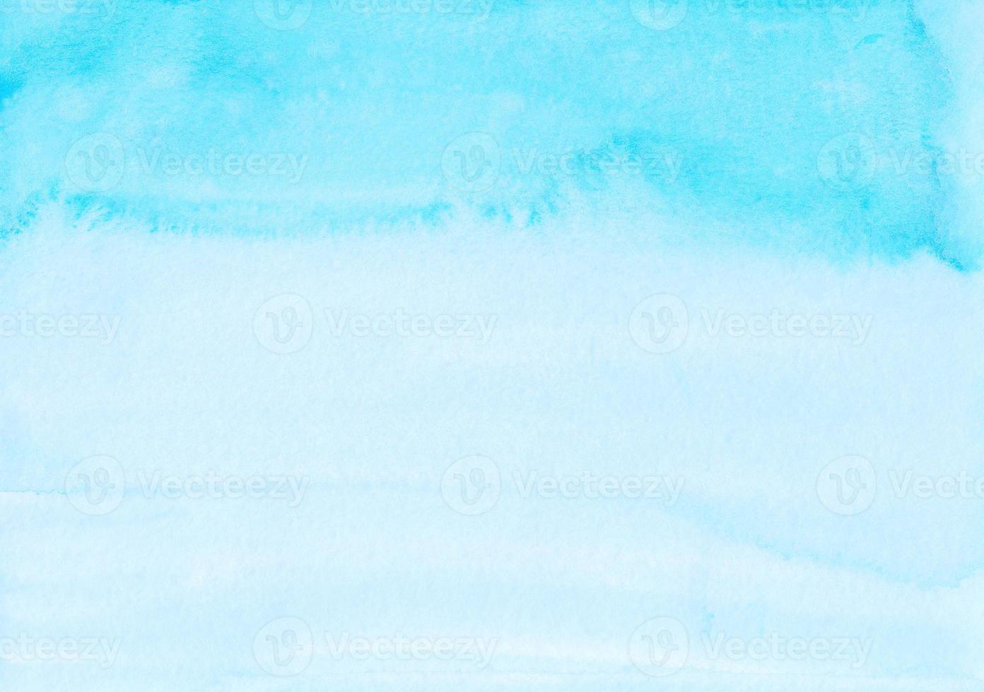 Watercolor light blue ombre background hand painted. Aquarelle sky blue texture. photo