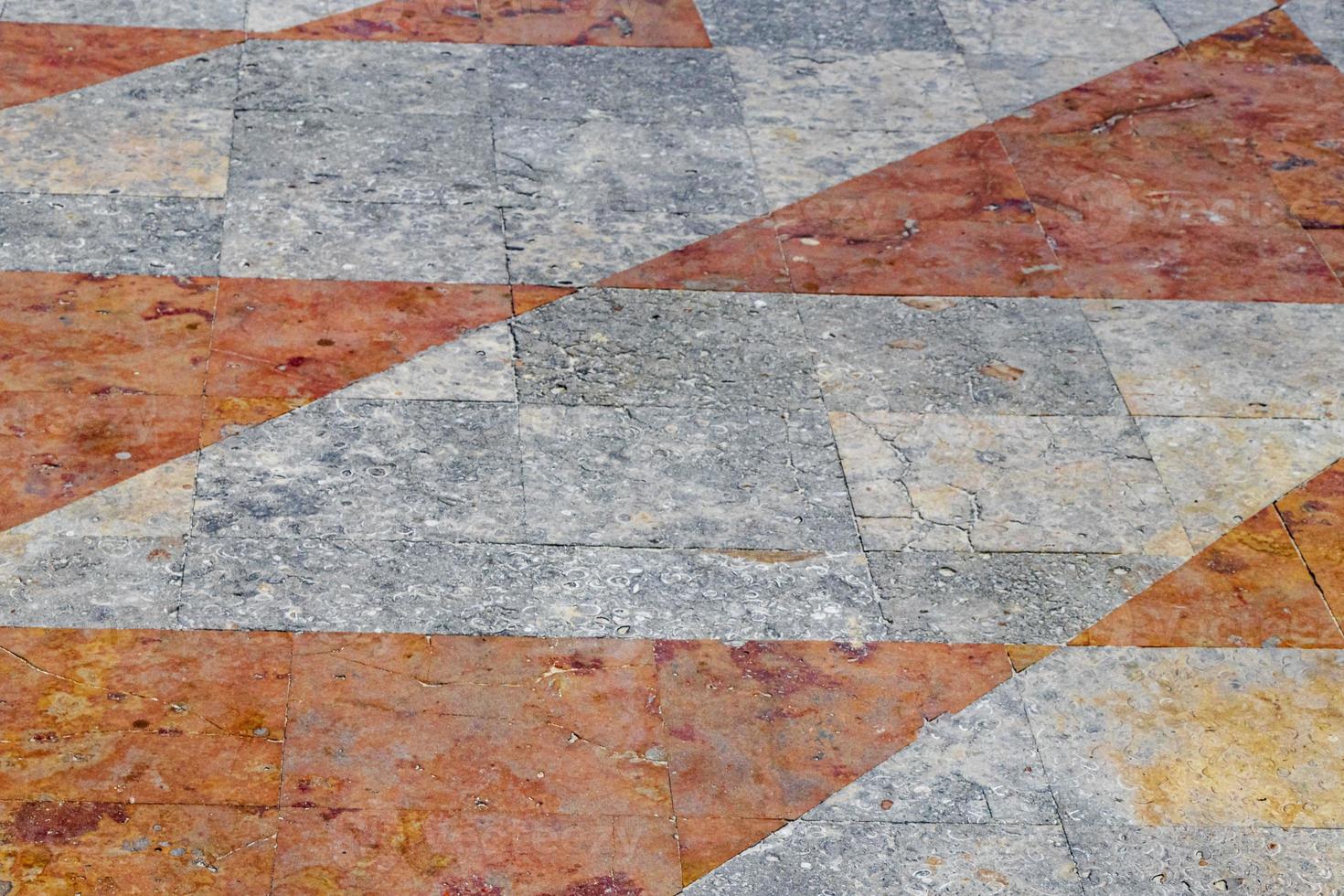 Beautiful red orange wall stone floor ground texture pattern Mexico. photo