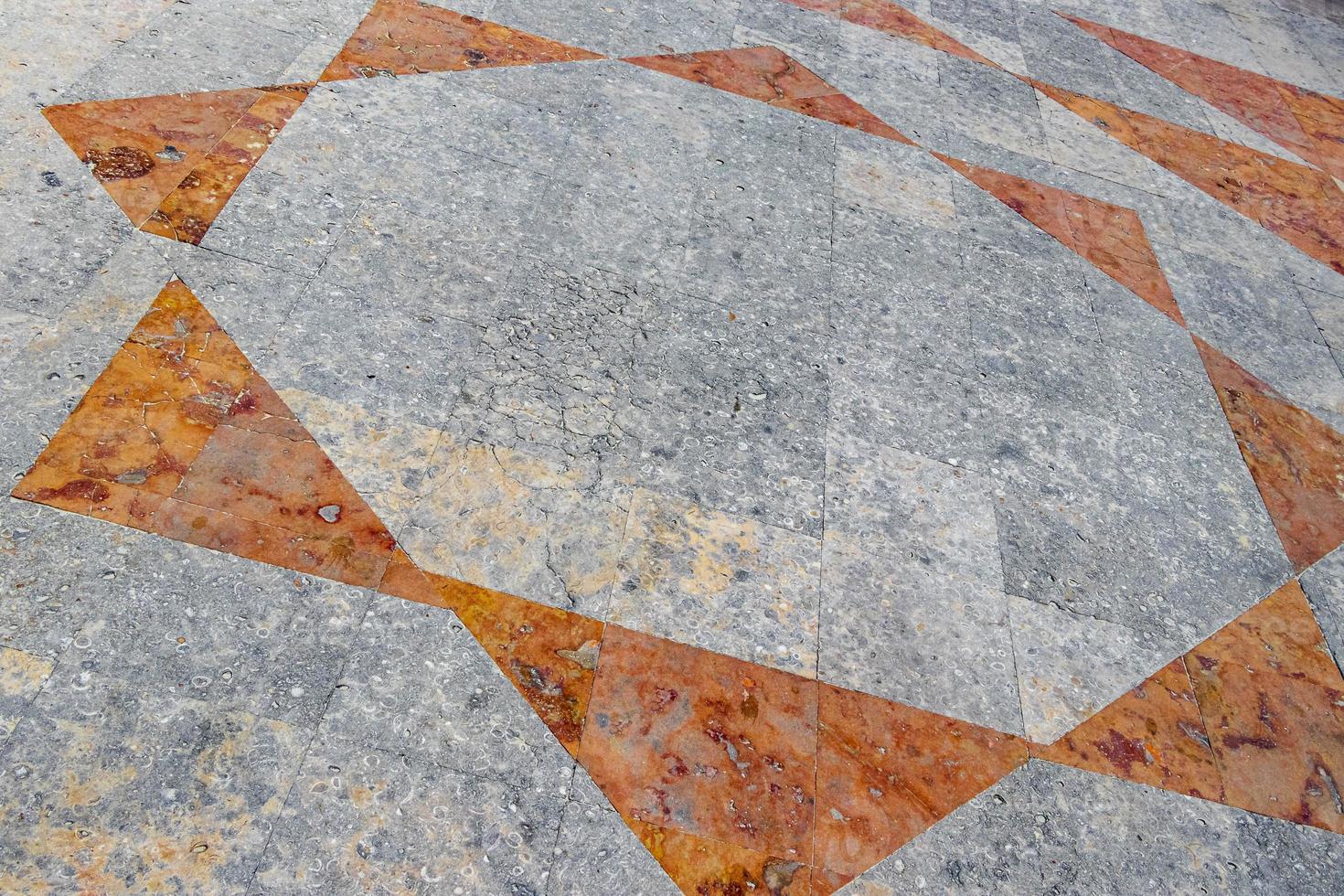 Beautiful red orange wall stone floor ground texture pattern Mexico. photo