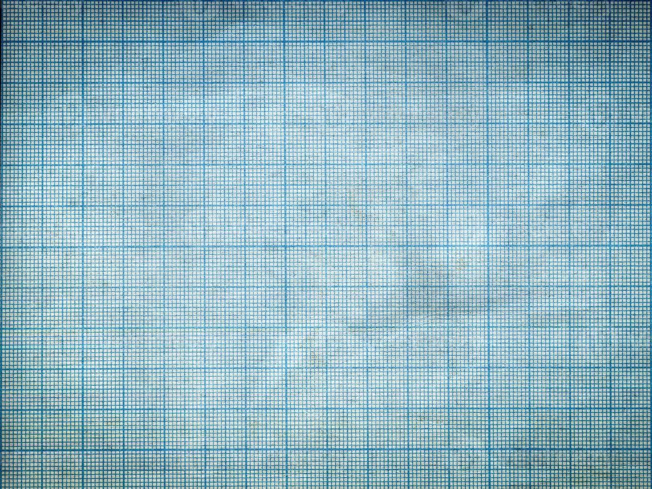 Old wrinkled grid scale paper sheet background photo