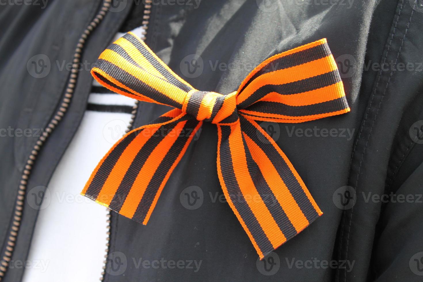 saint george striped ribbon on man clothes. 9 may victory day in russia photo