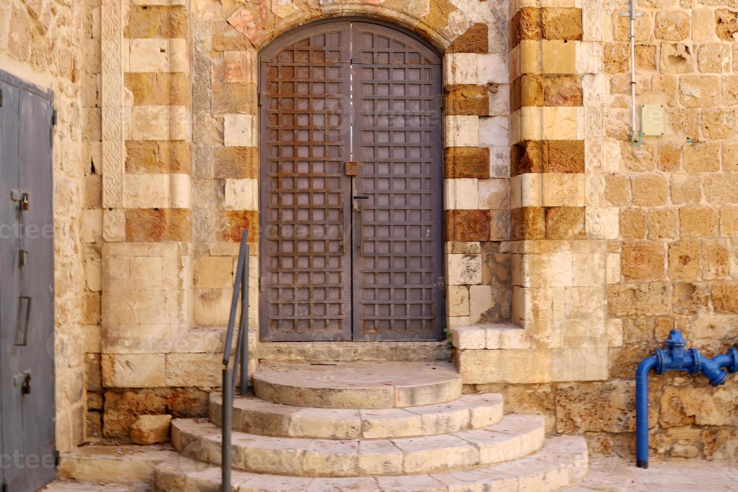 City entrance doors to a building in a big city in Israel. photo