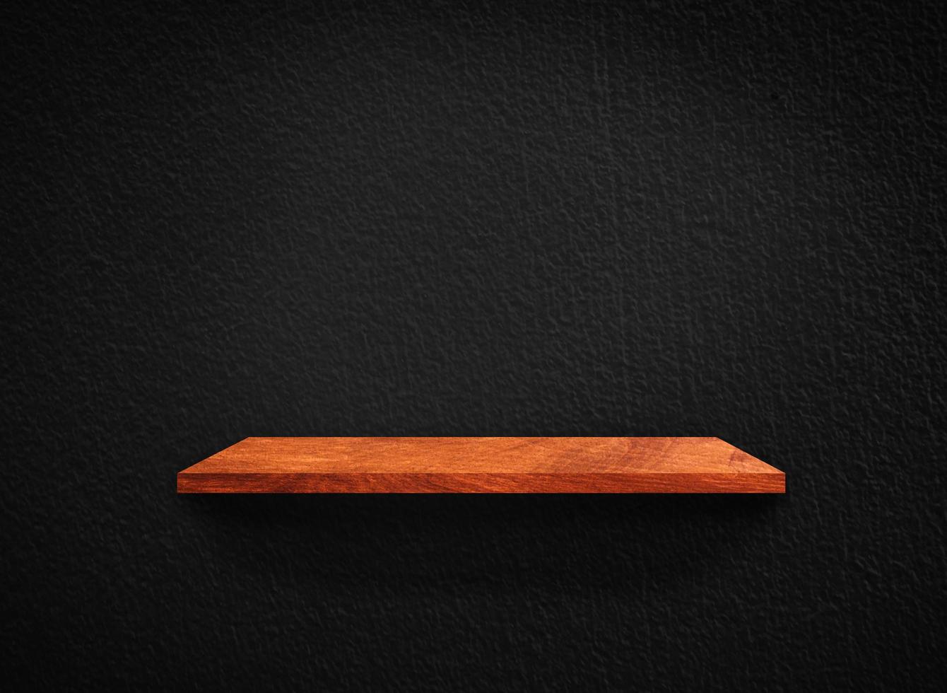 Light wood shelves on black wall texture in loft Style  background with clipping path. Design for wallpaper photo