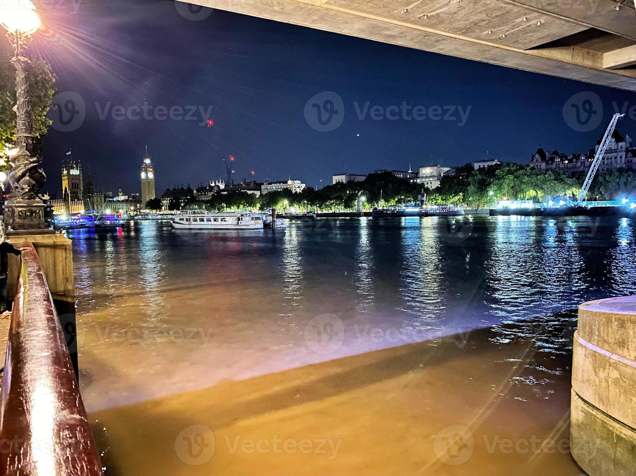 A view of the River Thames in London at night photo